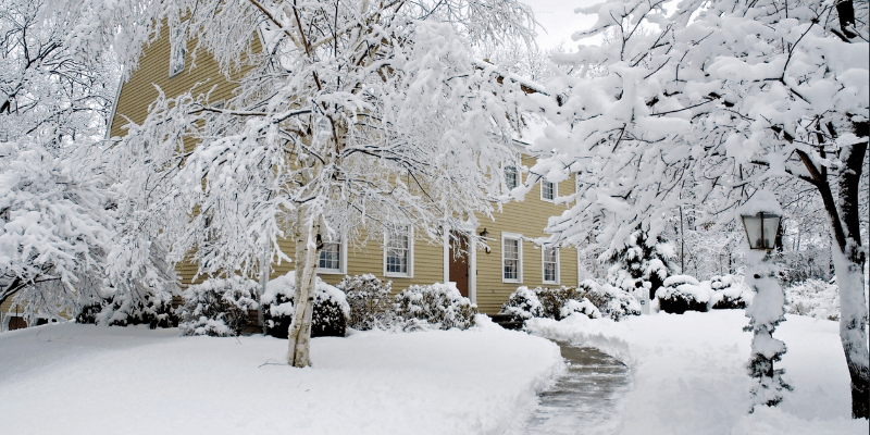 view of a snow covered house